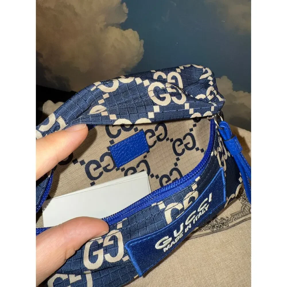 Gucci blue canvas monogram belt bag